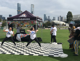 Multicultural festival featuring roving African drummers with Superhoodz dance group