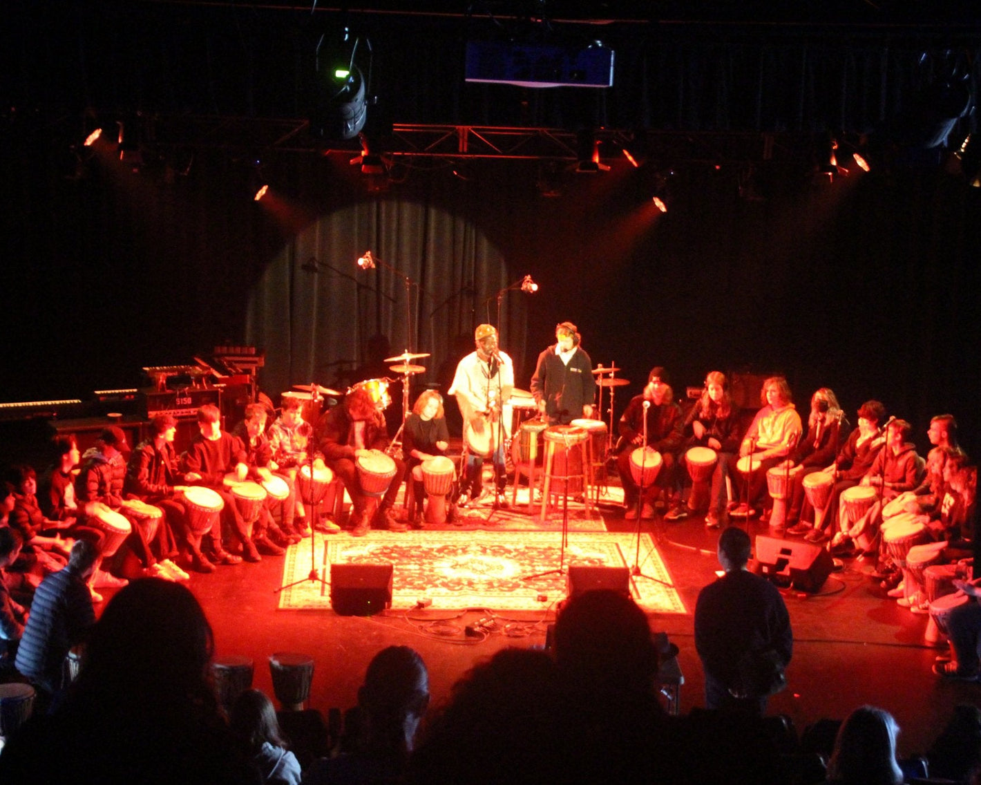 African drumming performance by school students